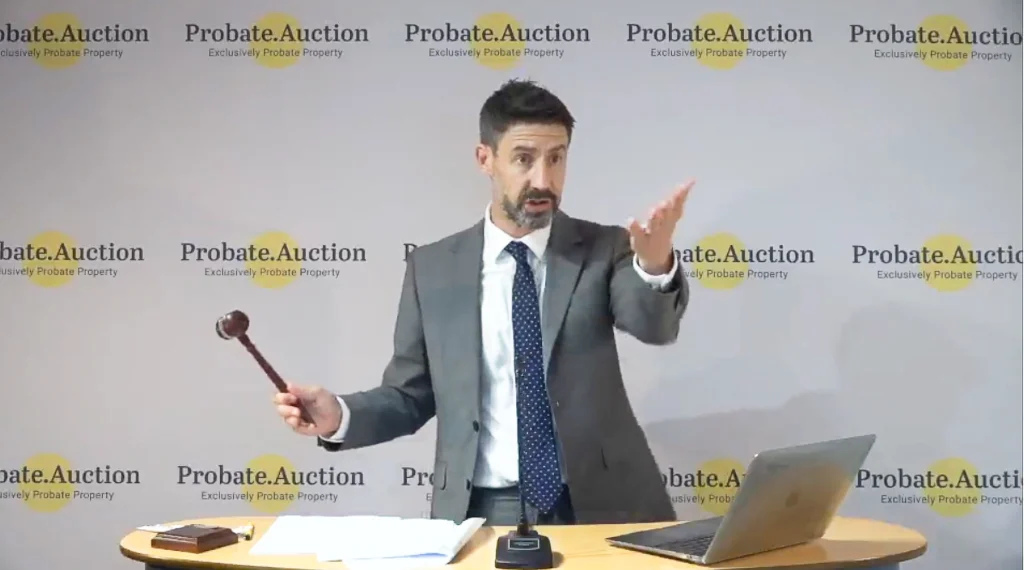 Russ in the auction room